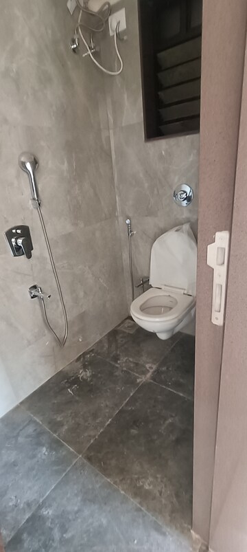 Bathroom in 1 BHK Apartment at Chaitanya The Greens Radhakunj, Kandivali East – for Rent