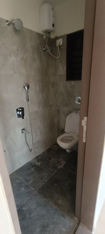 Bathroom in 1 BHK Apartment at Chaitanya The Greens Radhakunj, Kandivali East – for Rent