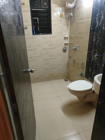 Bathroom in 1 BHK Apartment at Yasmin Tower, Agripada – for Sale
