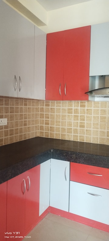 Kitchen in 2.5 BHK Apartment at Mahagun Mywoods, Sector 16c Greater Noida – for Rent