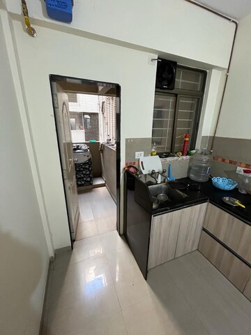 Kitchen in 2 BHK Apartment at Gulmohar Goldcoast, Kharadi – for Rent