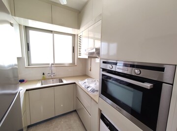Kitchen in 1 BHK Apartment at Hiranandani Regent Hill, Powai – for Rent