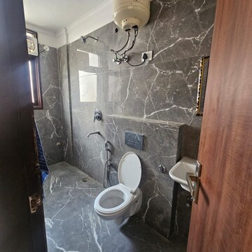 Bathroom in 1 BHK Apartment at Palm Residency Chhatarpur, Rajpur Khurd Extension – for Rent