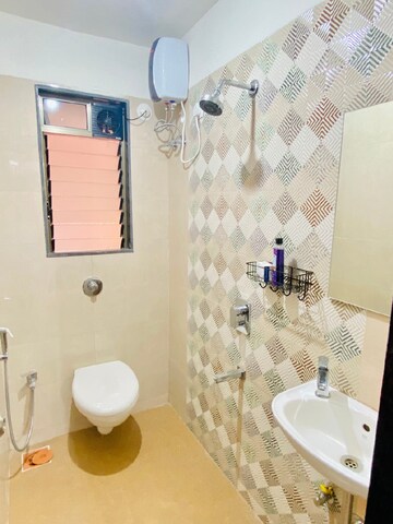 Bathroom in 1 BHK Apartment at Bindra Sateri Legacy, Andheri East – for Rent