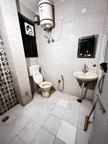 Bathroom in 1 BHK Builder Floor at Ansal Sushant Lok I, Sector 43 – for Rent
