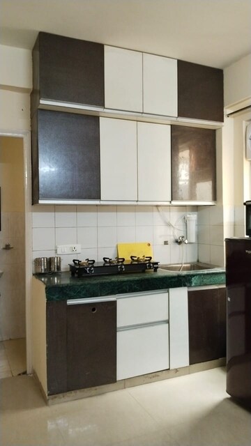 Kitchen in 1 BHK Apartment at ROF Aalayas, Sector 102 – for Rent