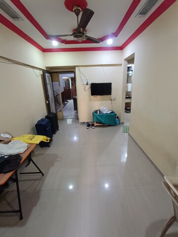 Living Room in 1 BHK Apartment at Om Prabhu Manohar CHS, Sector 50 – for Rent