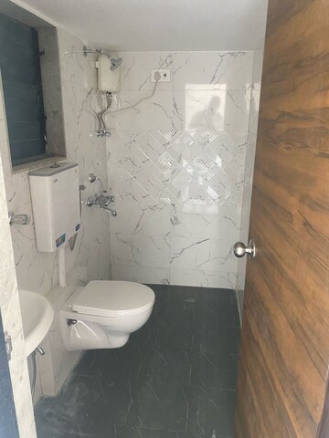 Bathroom in 2 BHK Apartment at Man Opus, Mira Road – for Rent