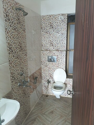 Bathroom in 2 BHK Apartment at Man Opus, Mira Road – for Rent