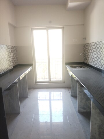 Kitchen in 1 BHK Apartment at Naupada – for Rent