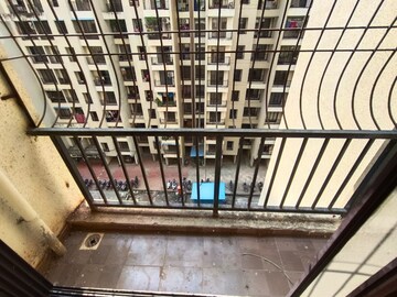 Balcony in 1 BHK Apartment at Rustomjee Global City – for Rent