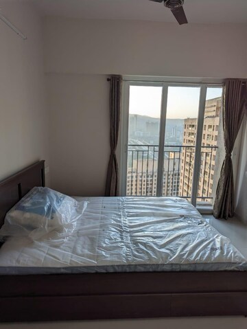 Bedroom in 2 BHK Apartment at Rustomjee Urbania Azziano, Majiwada – for Rent