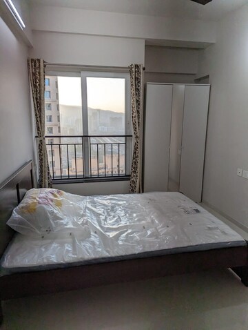 Bedroom in 2 BHK Apartment at Rustomjee Urbania Azziano, Majiwada – for Rent