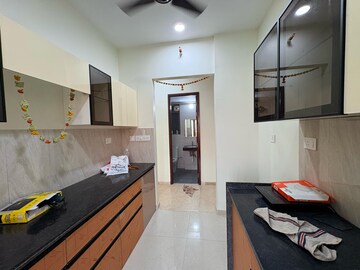 Kitchen in 2 BHK Apartment at Kalpataru Paramount, Kapur Bawdi – for Rent