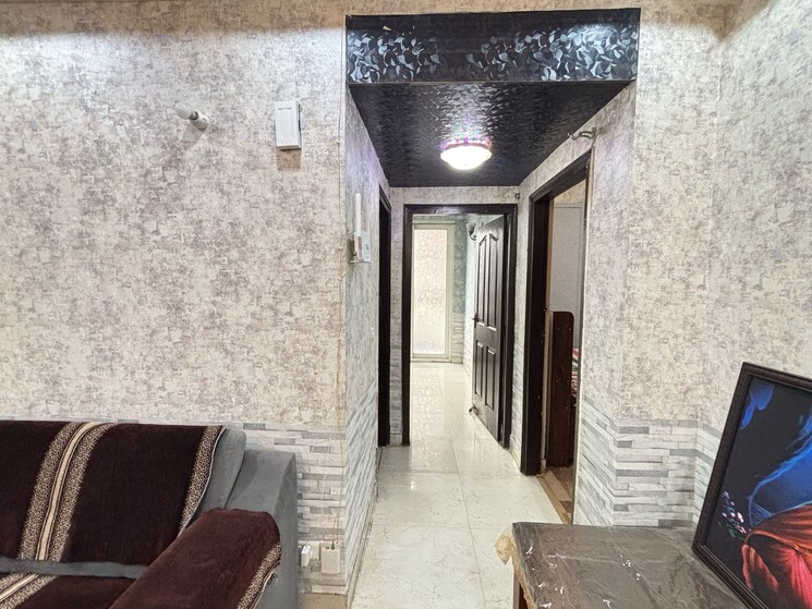 Living Room, wall-rock-aishwaryam 2 Bedroom 1060 Sq.Ft. Apartment In Sector 16c Greater Noida Greater Noida 8309881