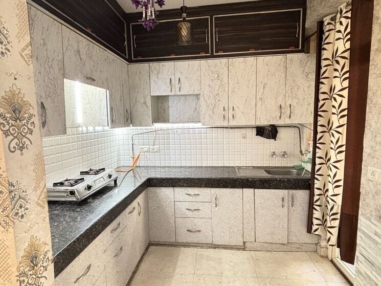 Kitchen, wall-rock-aishwaryam 2 Bedroom 1060 Sq.Ft. Apartment In Sector 16c Greater Noida Greater Noida 8309881