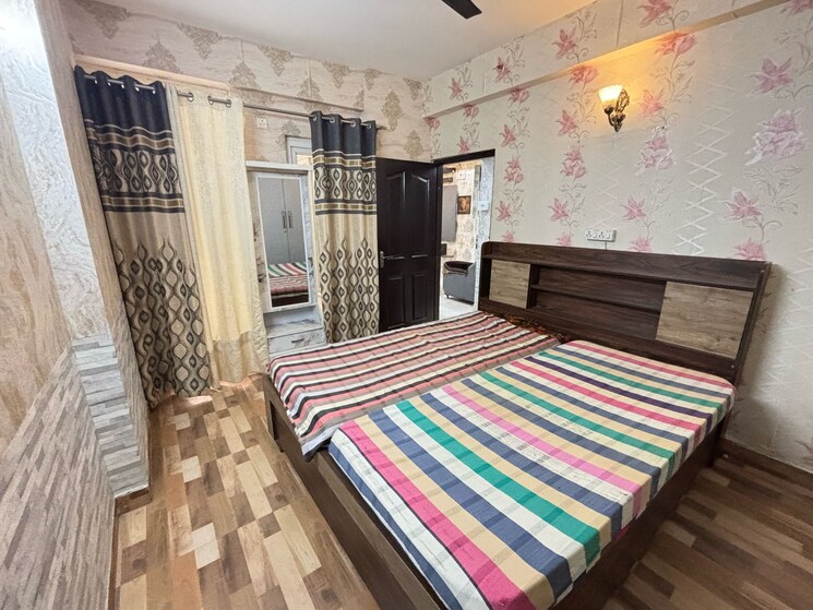 Bedroom, wall-rock-aishwaryam 2 Bedroom 1060 Sq.Ft. Apartment In Sector 16c Greater Noida Greater Noida 8309881