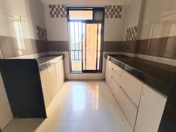Kitchen in 1 BHK Apartment at Rustomjee Global City – for Rent