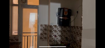 Kitchen in 4 BHK Apartment at Panchsheel Greens, Sector 16 Greater Noida – for Sale