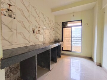Kitchen in 2 BHK Apartment at Rustomjee Global City – for Rent