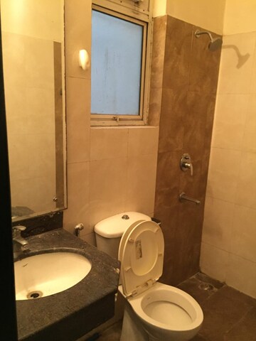 Bathroom in 3 BHK Apartment at Ansal API Esencia, Sector 67 – for Rent
