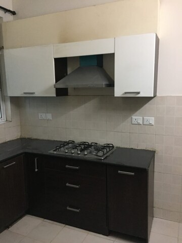 Kitchen in 3 BHK Apartment at Ansal API Esencia, Sector 67 – for Rent