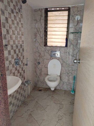 Bathroom in 2 BHK Apartment at Chandiwala Pearl Heaven, Andheri East – for Rent
