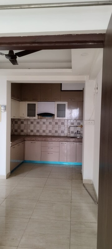 Kitchen in 3 BHK Apartment at Mahagun Mywoods, Sector 16c Greater Noida – for Rent