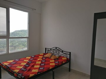 Bedroom in 2 BHK Apartment at Mittal Pebbles High Mont, Hinjewadi – for Rent