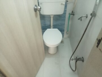 Bathroom in 2 BHK Apartment at Unique Ivana, Mira Road – for Rent