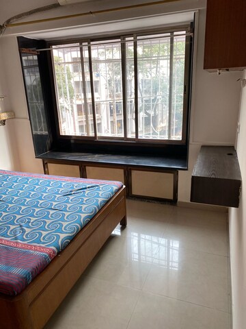 Bedroom in 2 BHK Apartment at Dhruv Heights, Malad East – for Rent