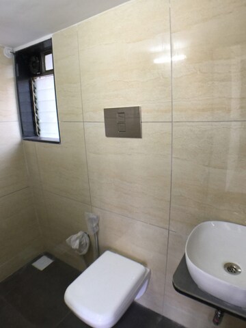 Bathroom in 2 BHK Apartment at RNA N G Silver Spring, Mira Road – for Sale