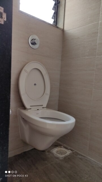 Bathroom in 1 BHK Apartment at Vihang Valley Phase 2, Kasarvadavali – for Rent