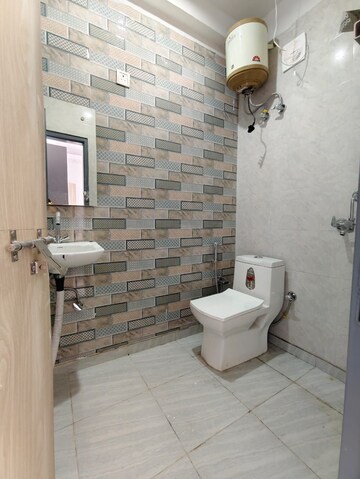 Bathroom in 1 RK Builder Floor at Ansal Sushant Lok I, Sector 43 – for Rent
