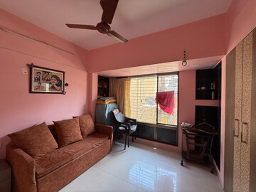Living Room in 2 BHK Apartment at Seawoods – for Sale