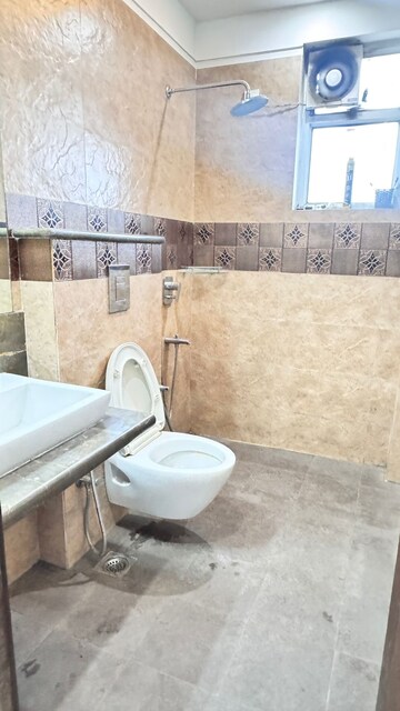 Bathroom in 3 BHK Builder Floor at Ansal Sushant Lok I, Sector 43 – for Rent