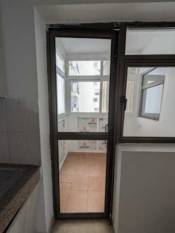 Kitchen in 2.5 BHK Apartment at Raj Nagar Extension – for Sale
