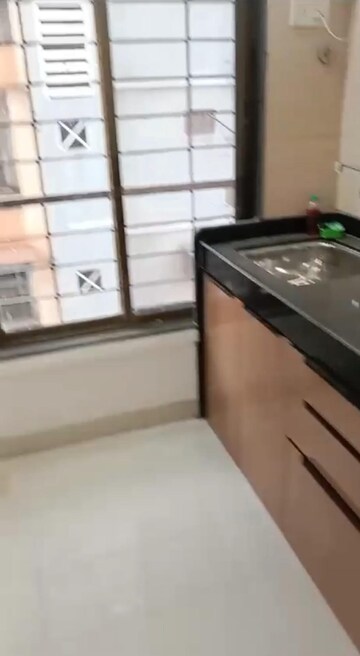 Kitchen in 2 BHK Apartment at Omkar CHS Andheri, Andheri East – for Rent