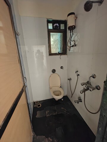Bathroom in 3.5 BHK Apartment at Rukmini Chaya Apartment, Seawoods – for Rent