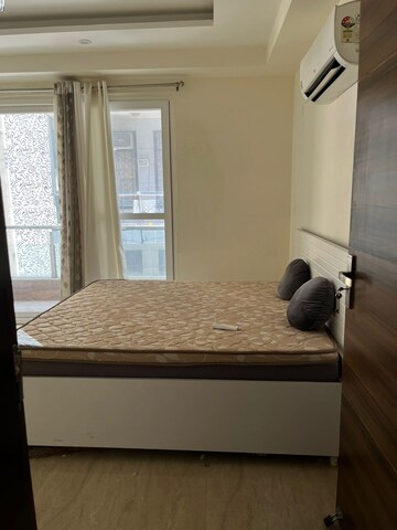 Bedroom in 3 BHK Builder Floor at Ansal Sushant Lok I, Sector 43 – for Rent