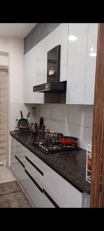 Kitchen in 2 BHK Apartment at Godrej Palm Retreat, Sector 150 – for Sale