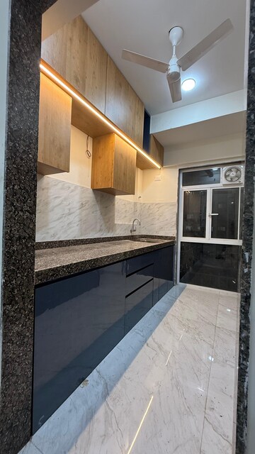 Kitchen in 2 BHK Apartment at Chandak Cornerstone, Worli – for Rent