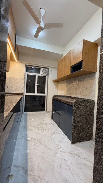 Kitchen in 2 BHK Apartment at Chandak Cornerstone, Worli – for Rent