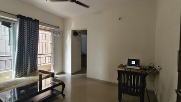 Living Room in 1 BHK Apartment at Vihang Hills, Ghodbunder Road – for Sale