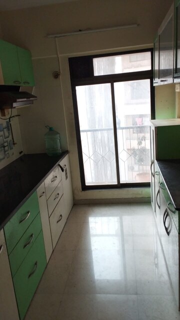 Kitchen in 2 BHK Apartment at New Vegas Plaza, Owale – for Sale