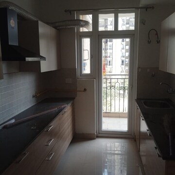 Kitchen in 3 BHK Apartment at ATS Nobility, Sector 4, Greater Noida – for Rent