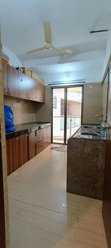 Kitchen in 2 BHK Apartment at HDIL Metropolis Residences, Andheri West – for Sale