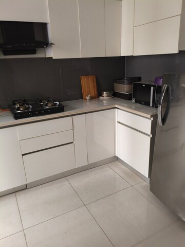 Kitchen in 3 BHK Apartment at Central Park Flower Valley Aqua Front Towers, Sohna Sector 33 – for Rent