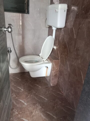 Bathroom in 1 BHK Apartment at Ornate Galaxy, Naigaon East – for Rent