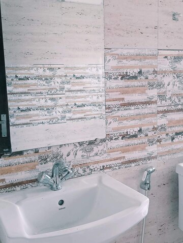 Bathroom in 2 BHK Apartment at Amrapali Golf Homes, Sector 4, Greater Noida – for Rent